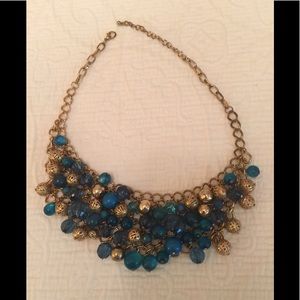 Gold tone necklace with turquoise & gold beads